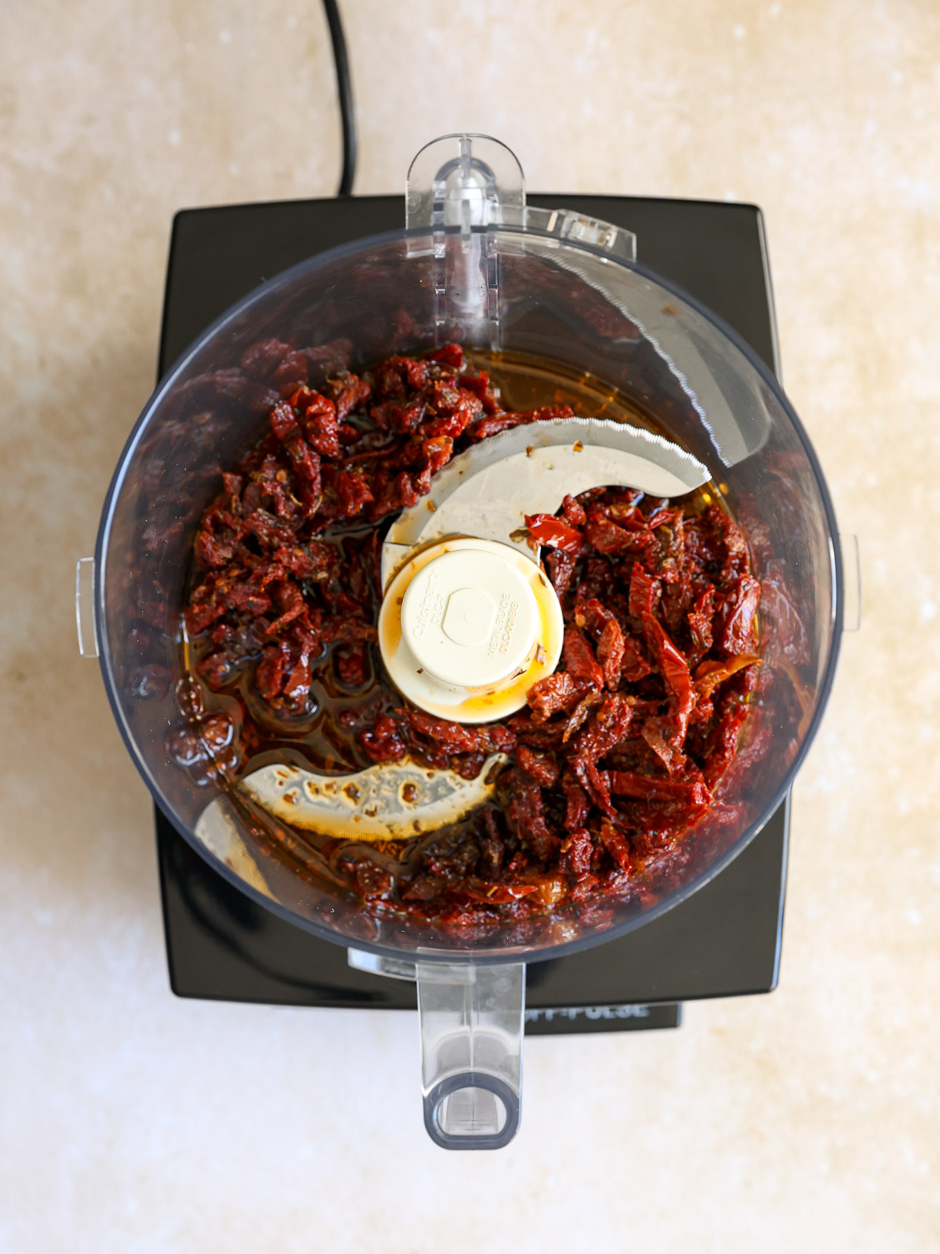 sun dried tomatoes in a food processor.