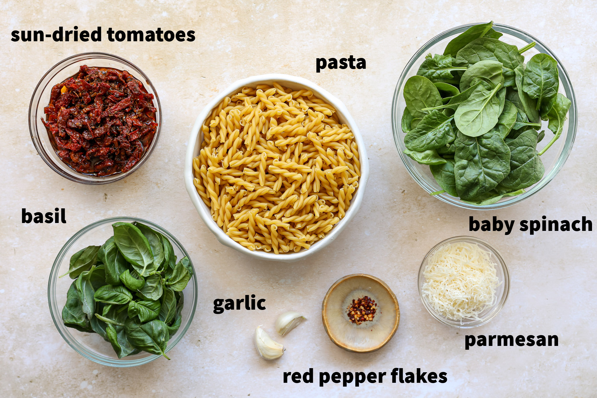 ingredients for spinach and sundried tomato pasta recipe.
