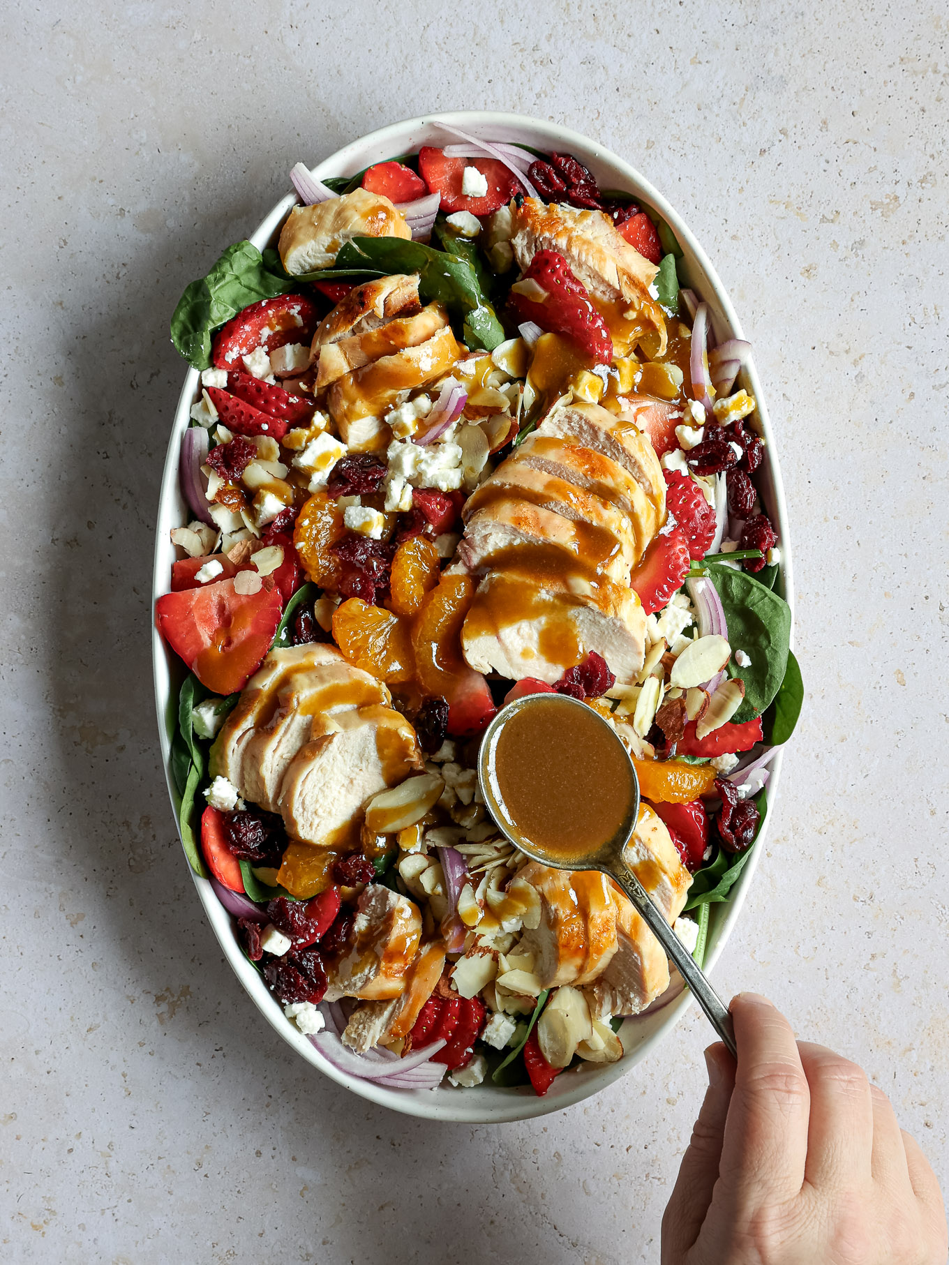 balsamic dressing drizzled over spinach salad.