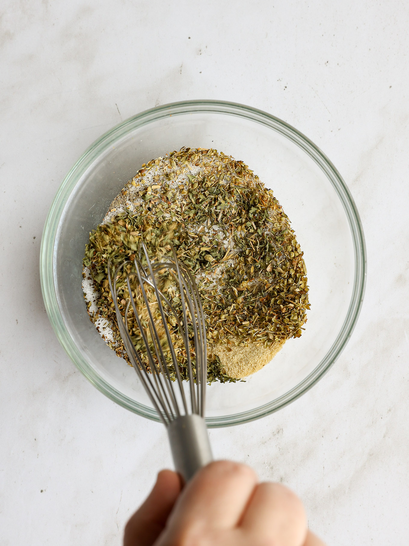 spices mixed with a whisk.