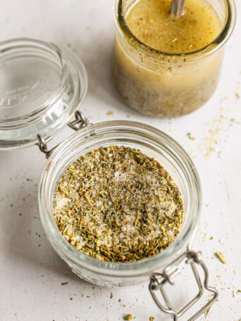 dry Italian dressing mix in a glass jar.