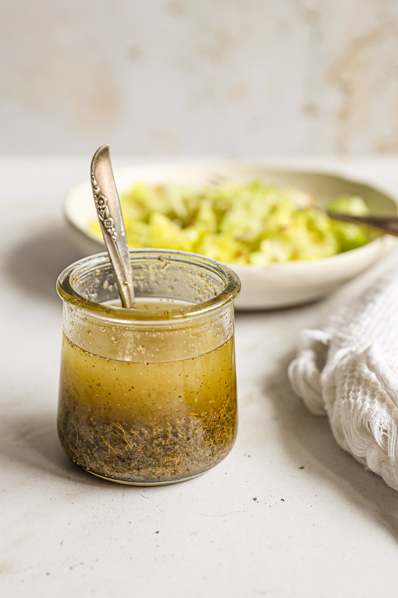 zesty italian dressing in a glass jar.