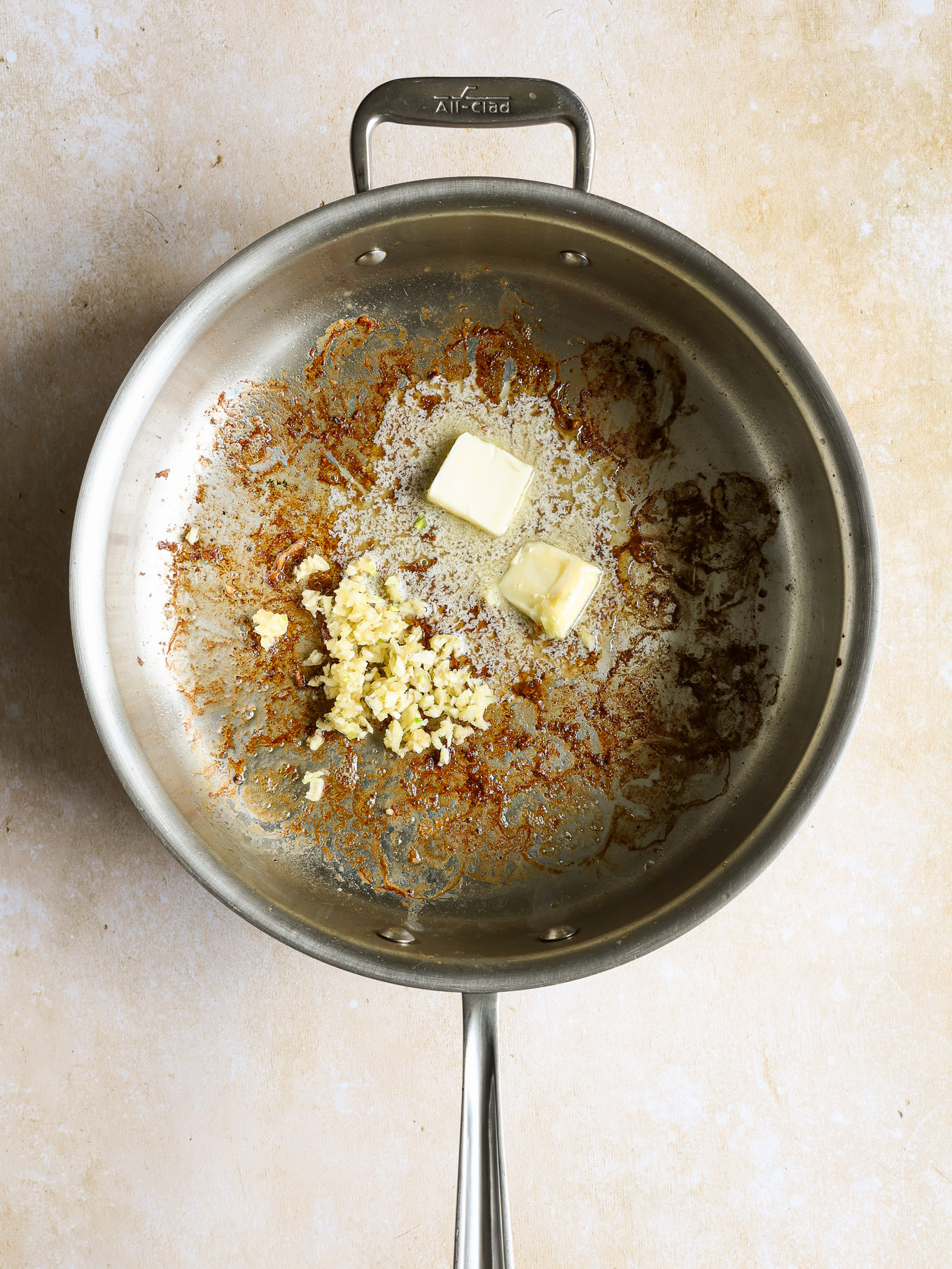 minced garlic with butter in a pan.