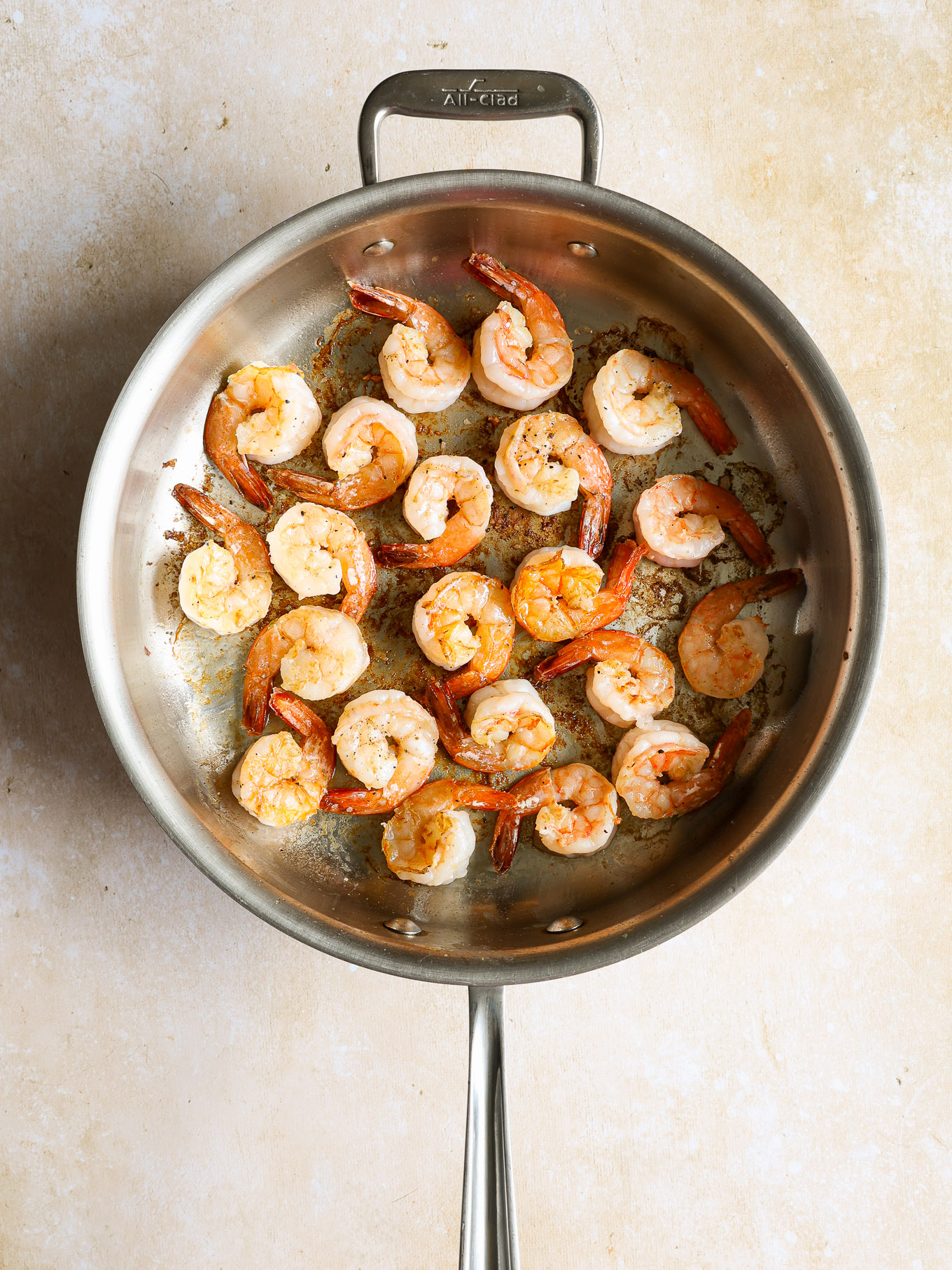 seared shrimp in a saucepan.