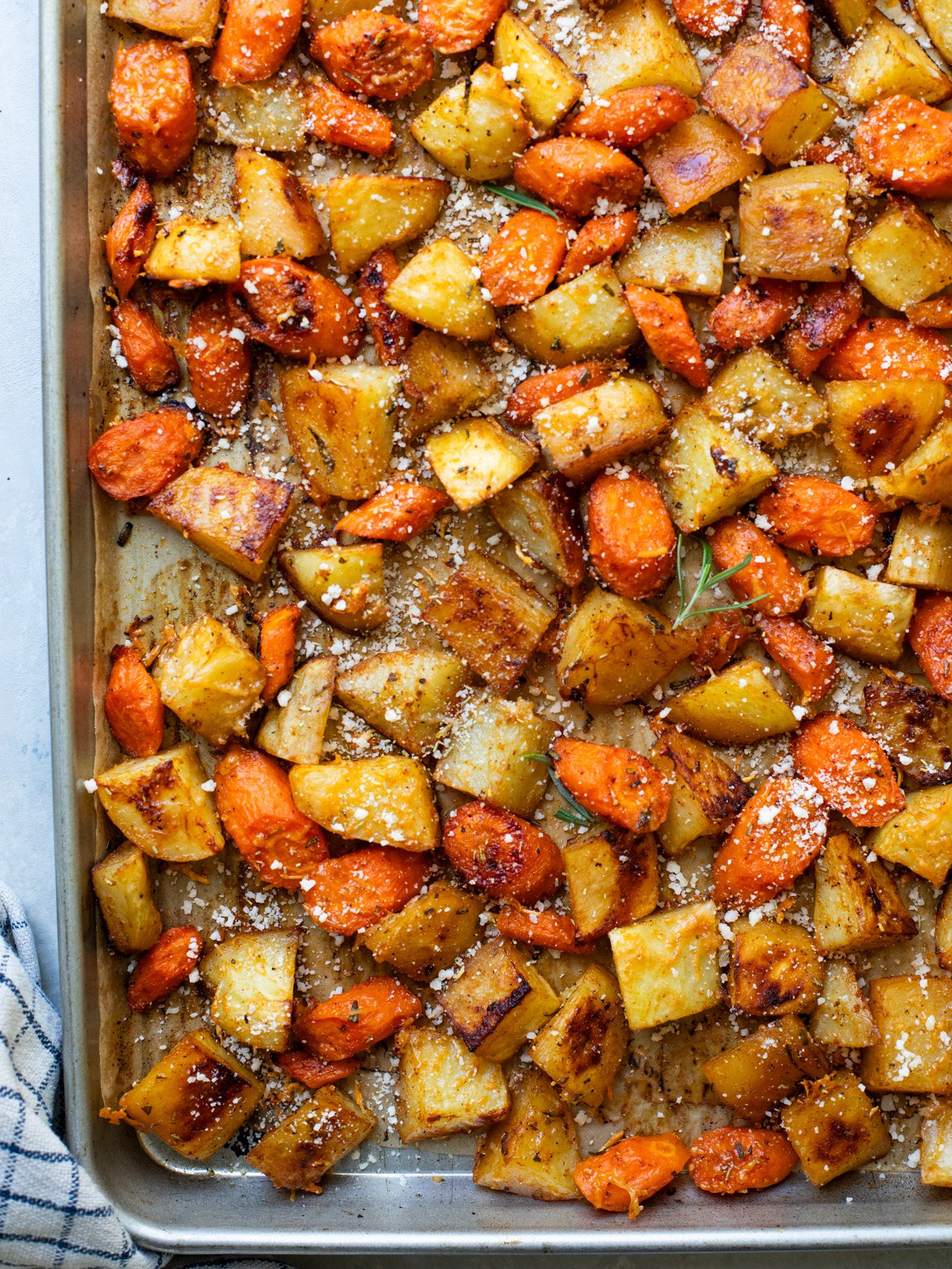 roasted carrots and potatoes on a sheet pan.