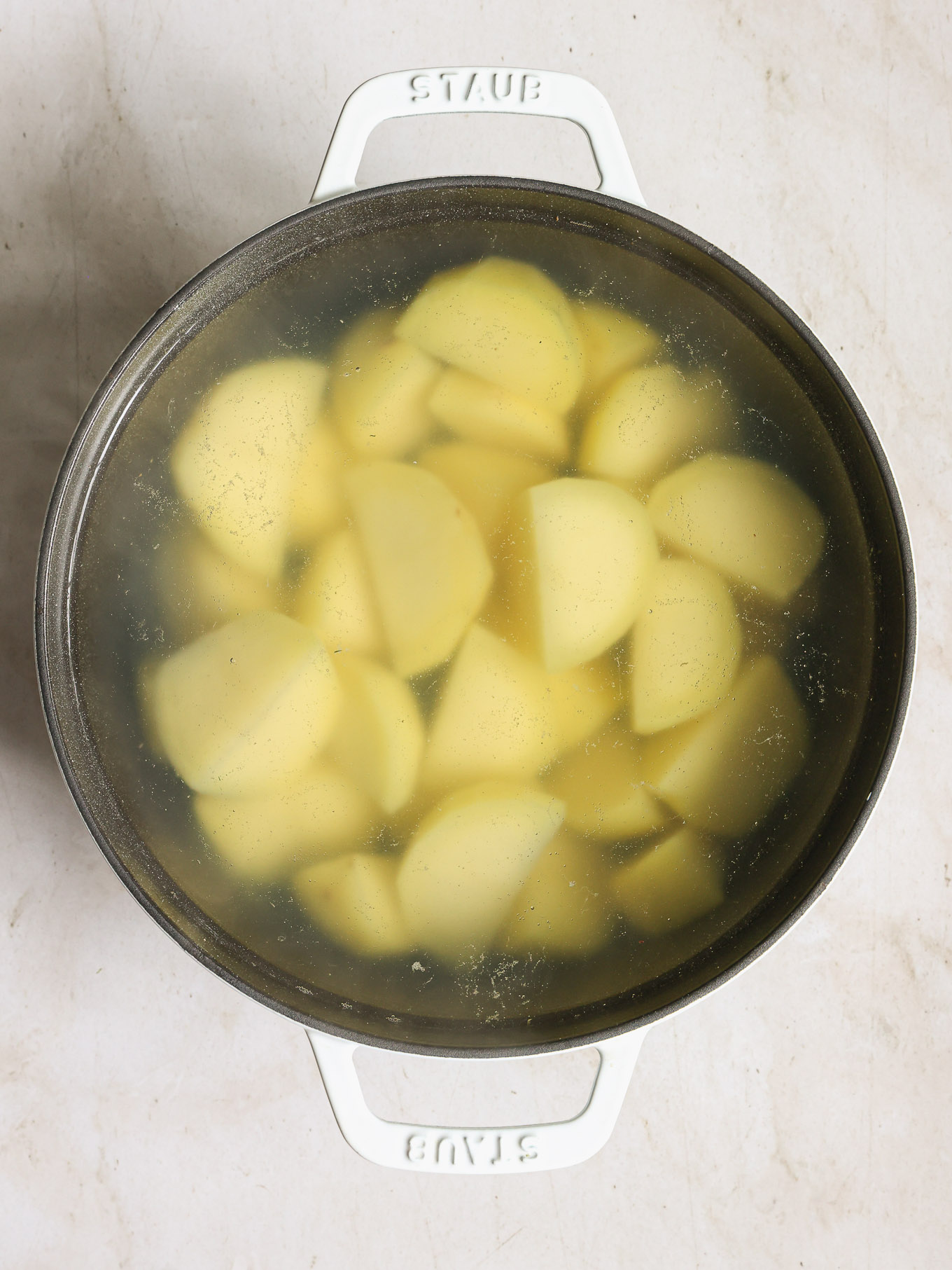 boiled potatoes in a pot.