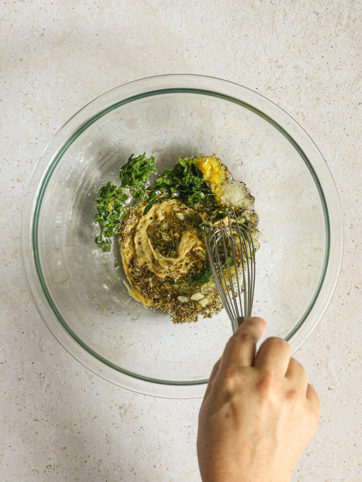 marinade whisked in a glass bowl.