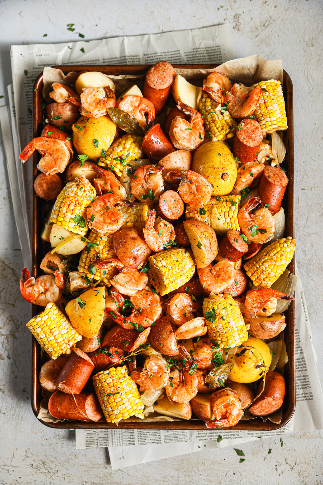 boil with shrimp and corn garnished with parsley.