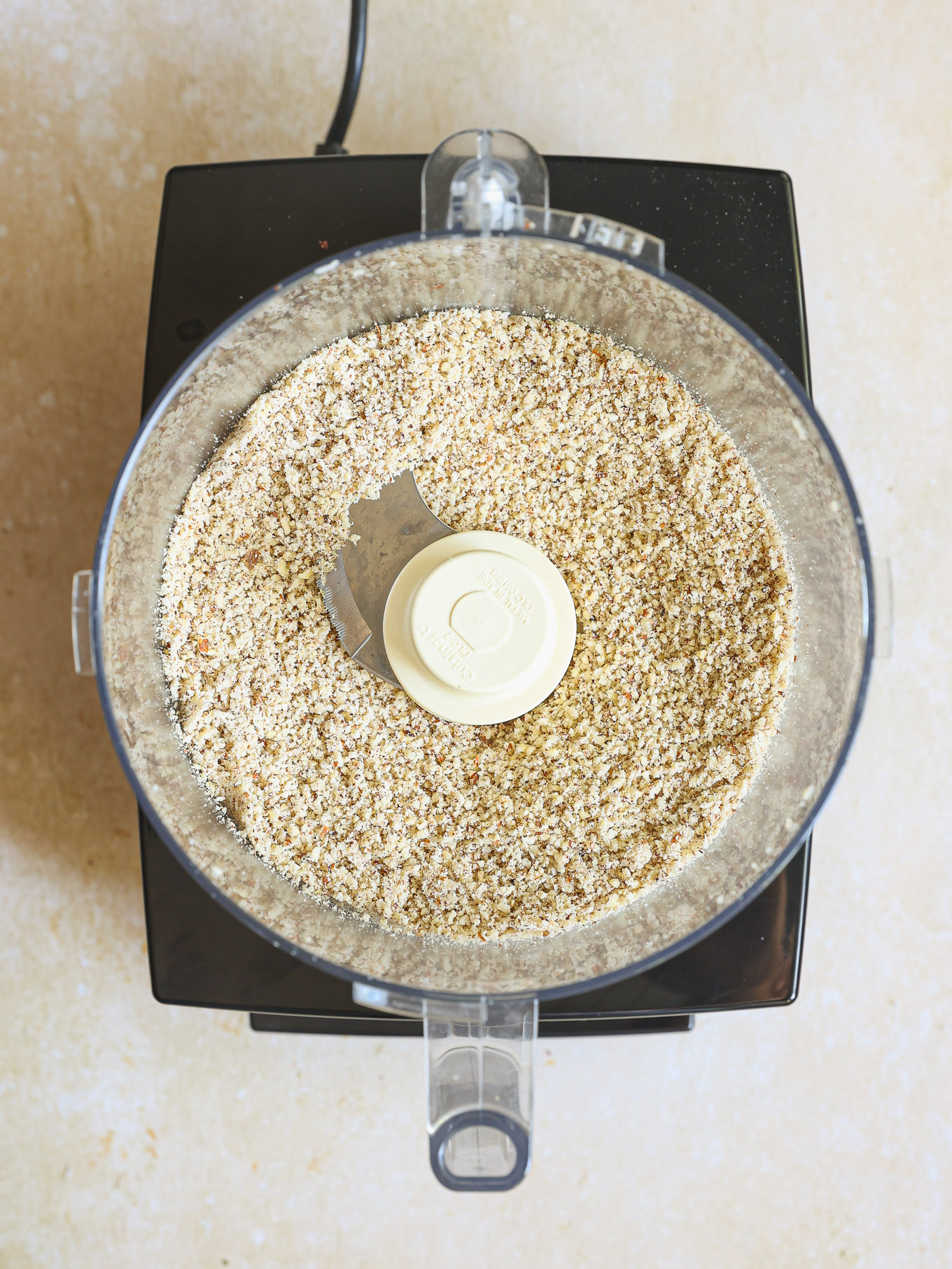 grinded nuts in a food processor.