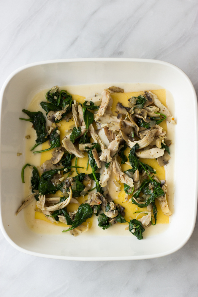 lasagna noodles with chicken filling and cream sauce.