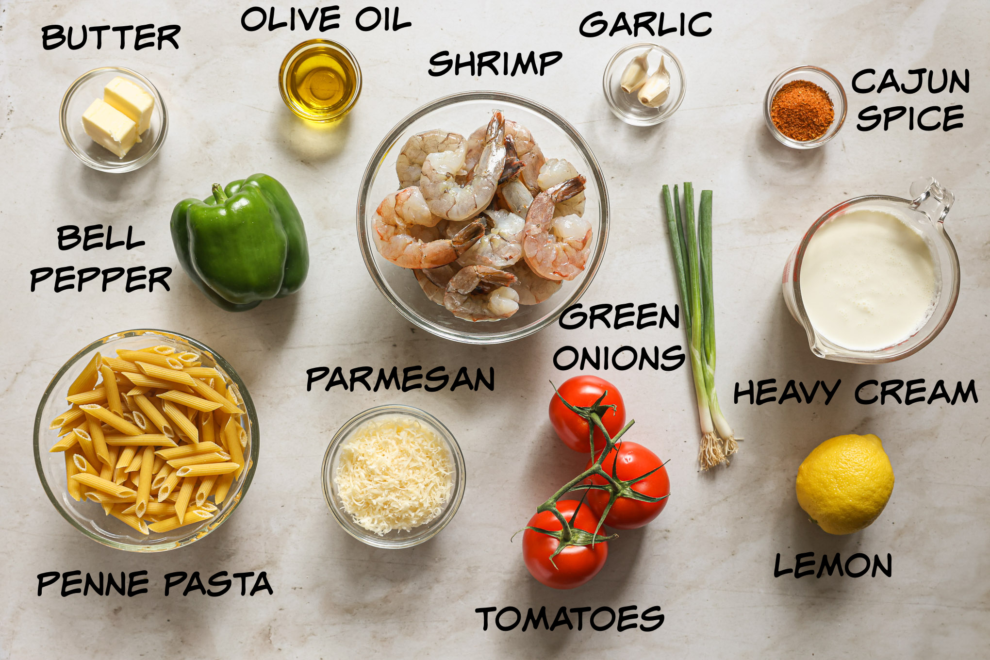 ingredients for creamy cajun shrimp pasta.