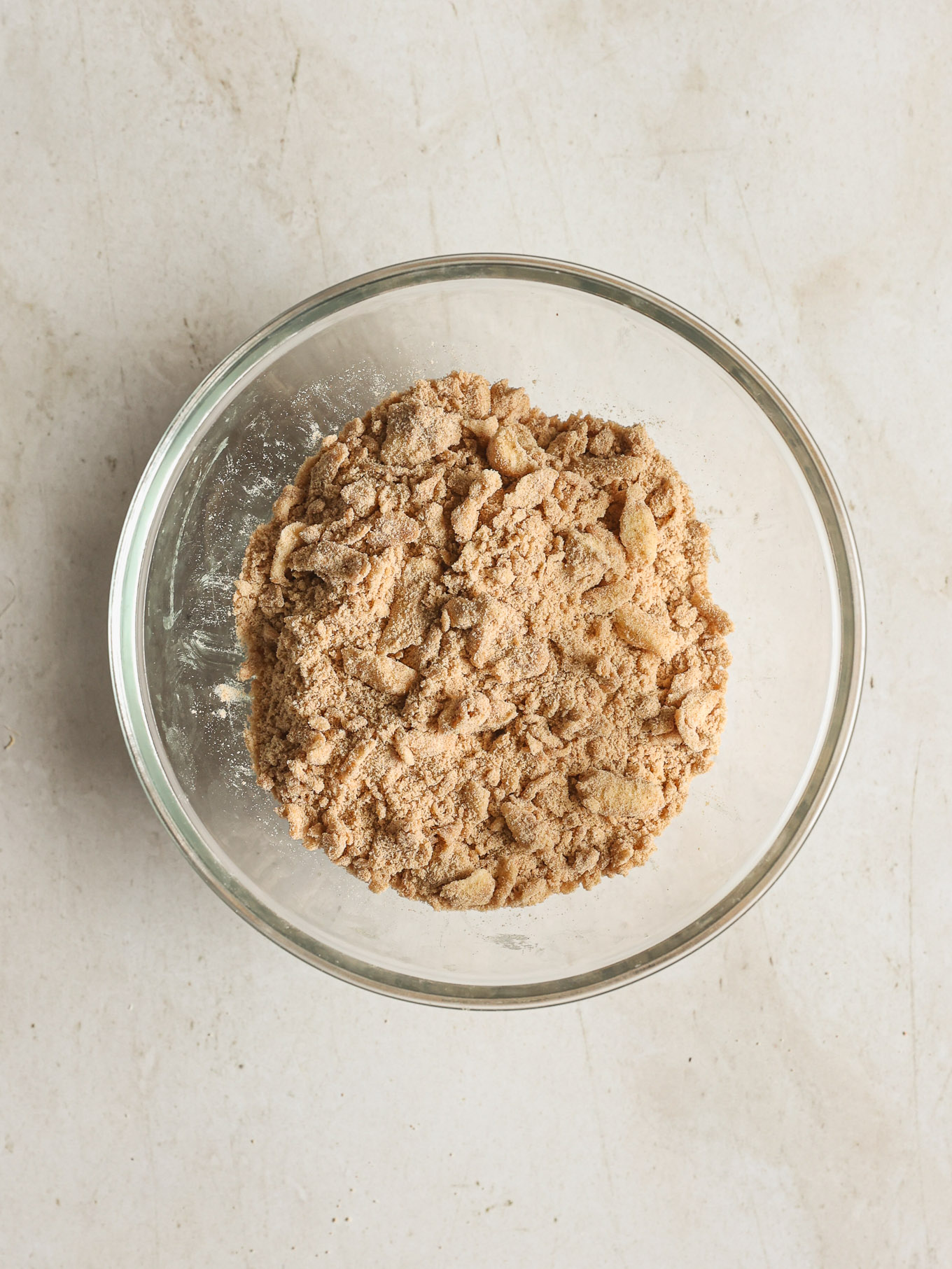 streusel topping with butter in glass bowl.
