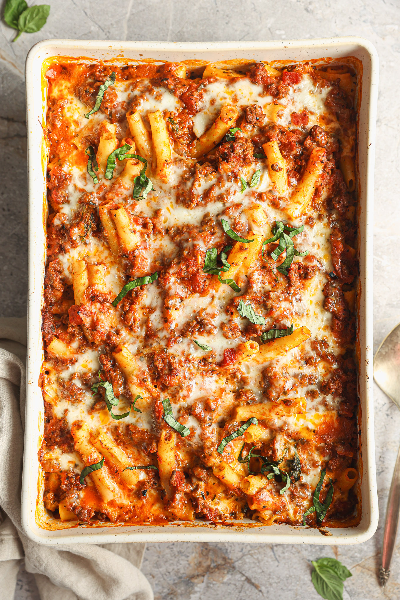 baked ziti in white baking dish.