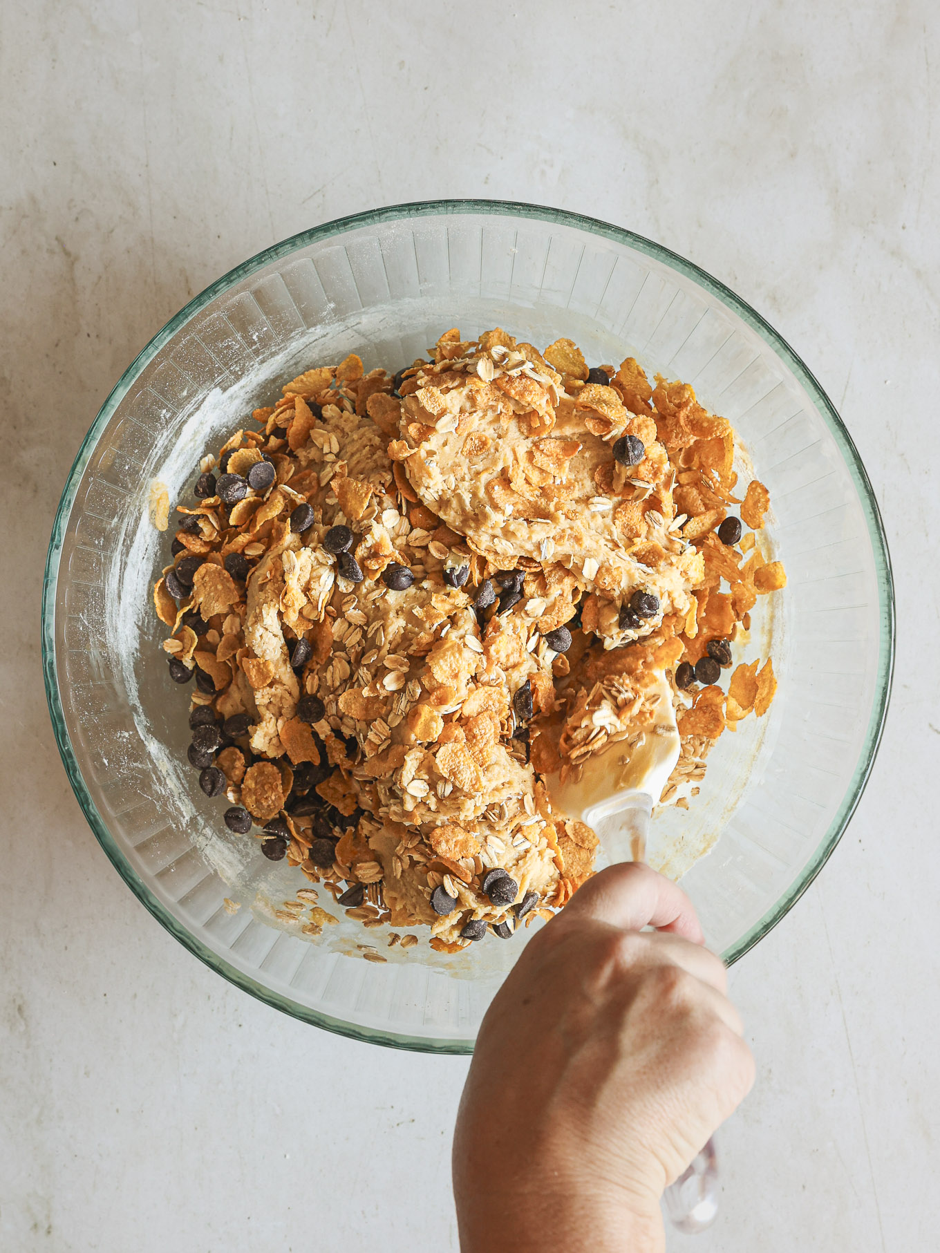 cornflakes and chocolate chips in cookie dough.