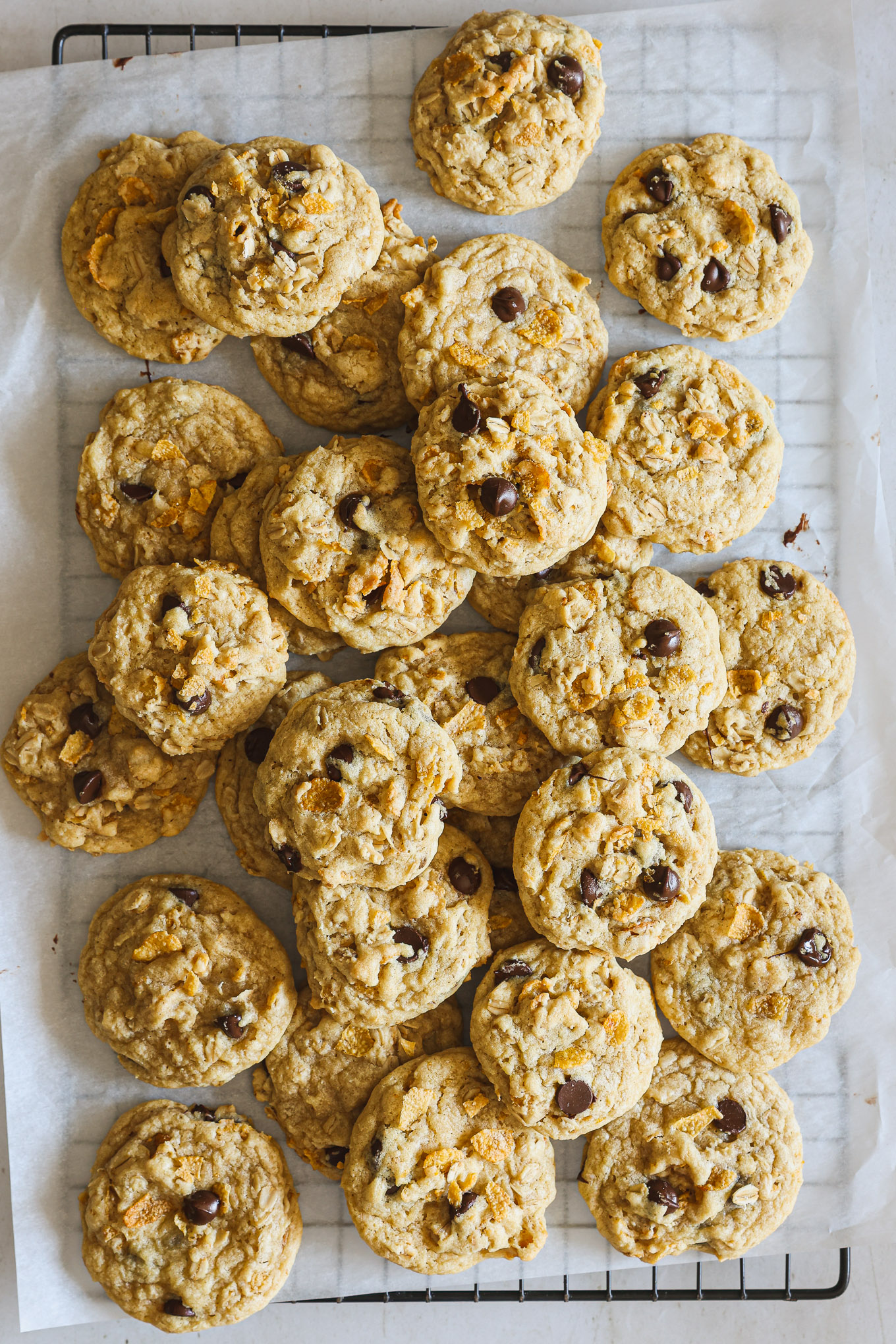 cornflake cookies on parchment paper.