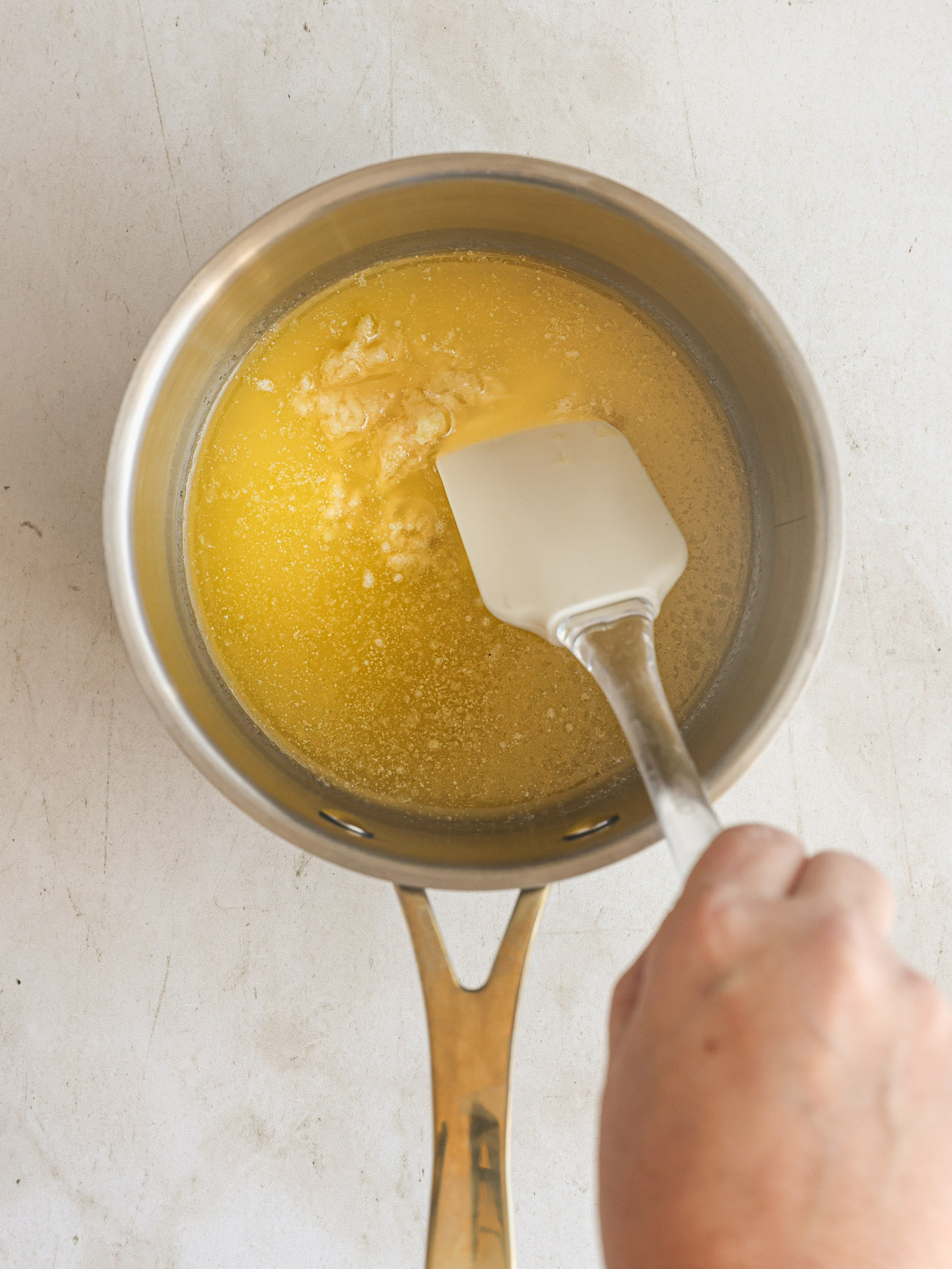melted butter in saucepan.