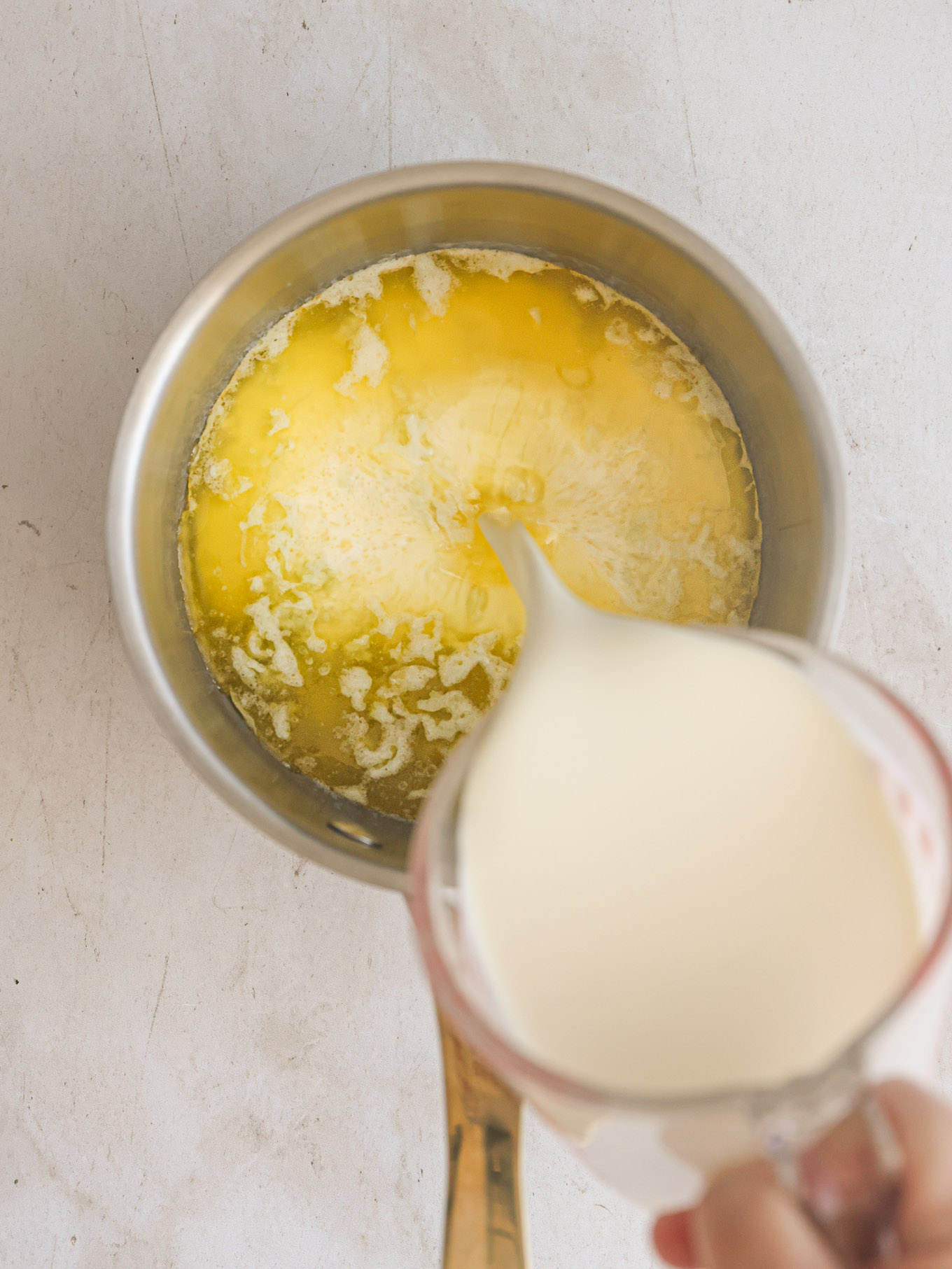 milk and butter in saucepan.