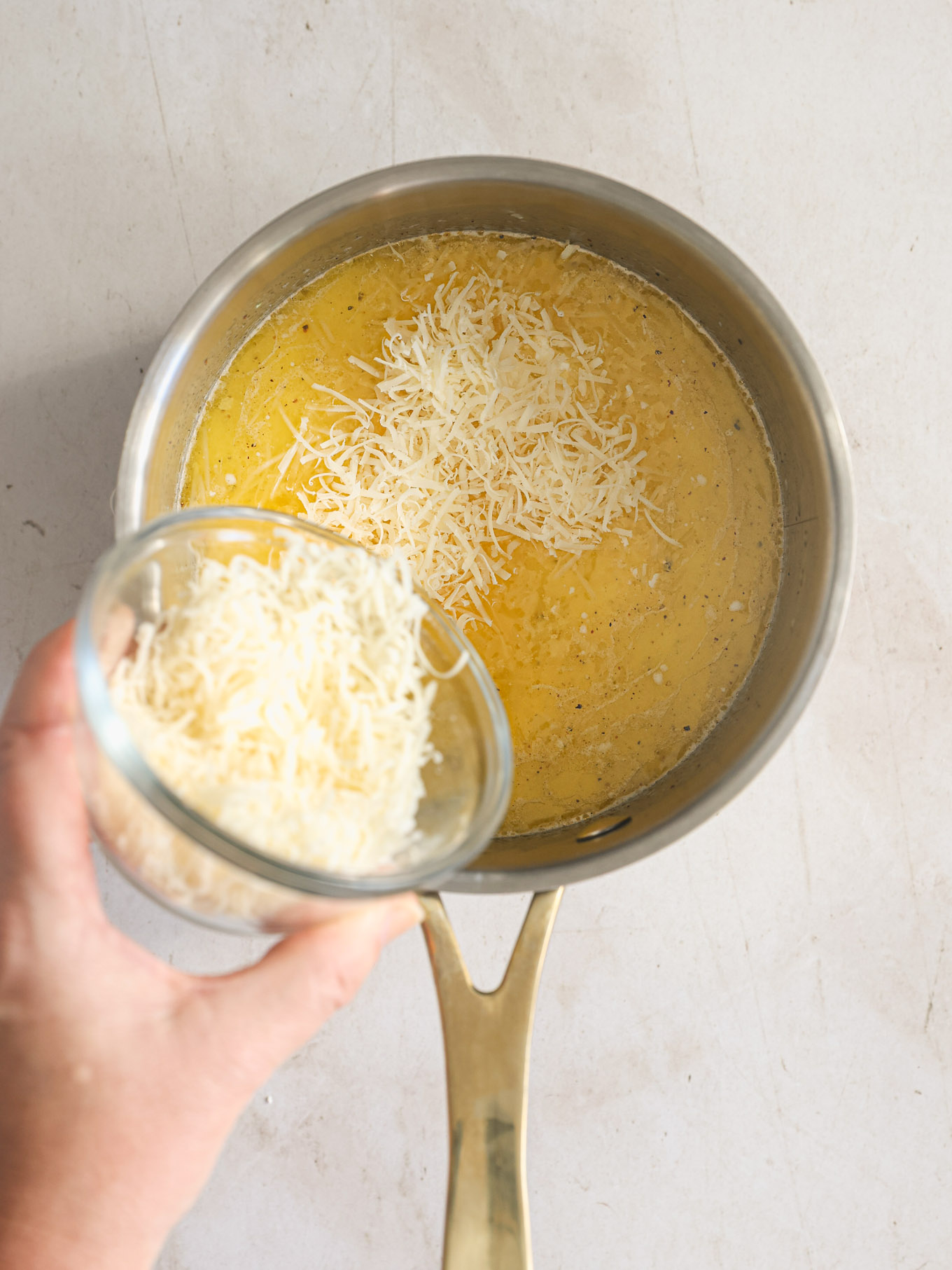 parmesan sprinkled over milk mixture.