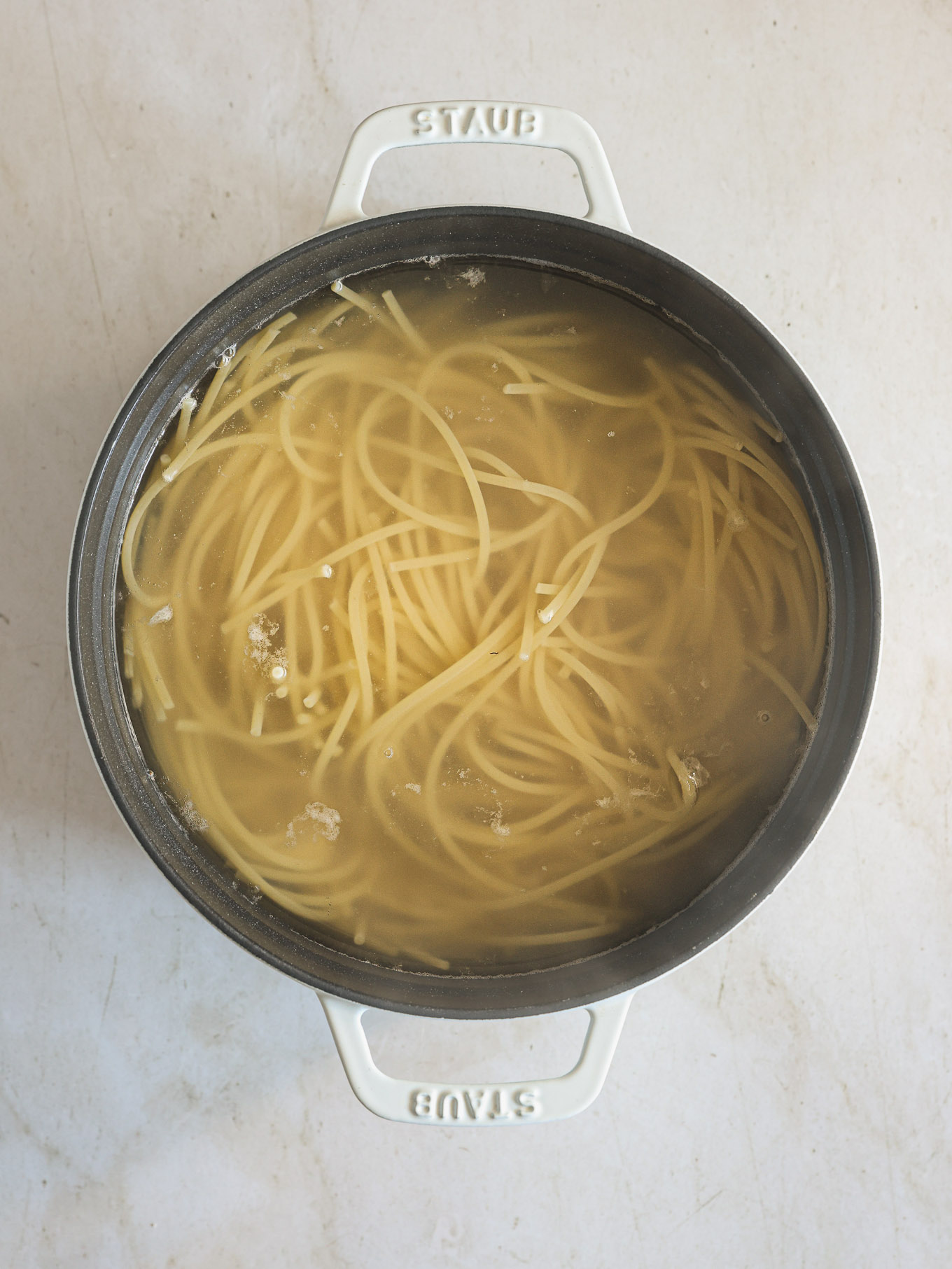 cooked spaghetti in a pot.
