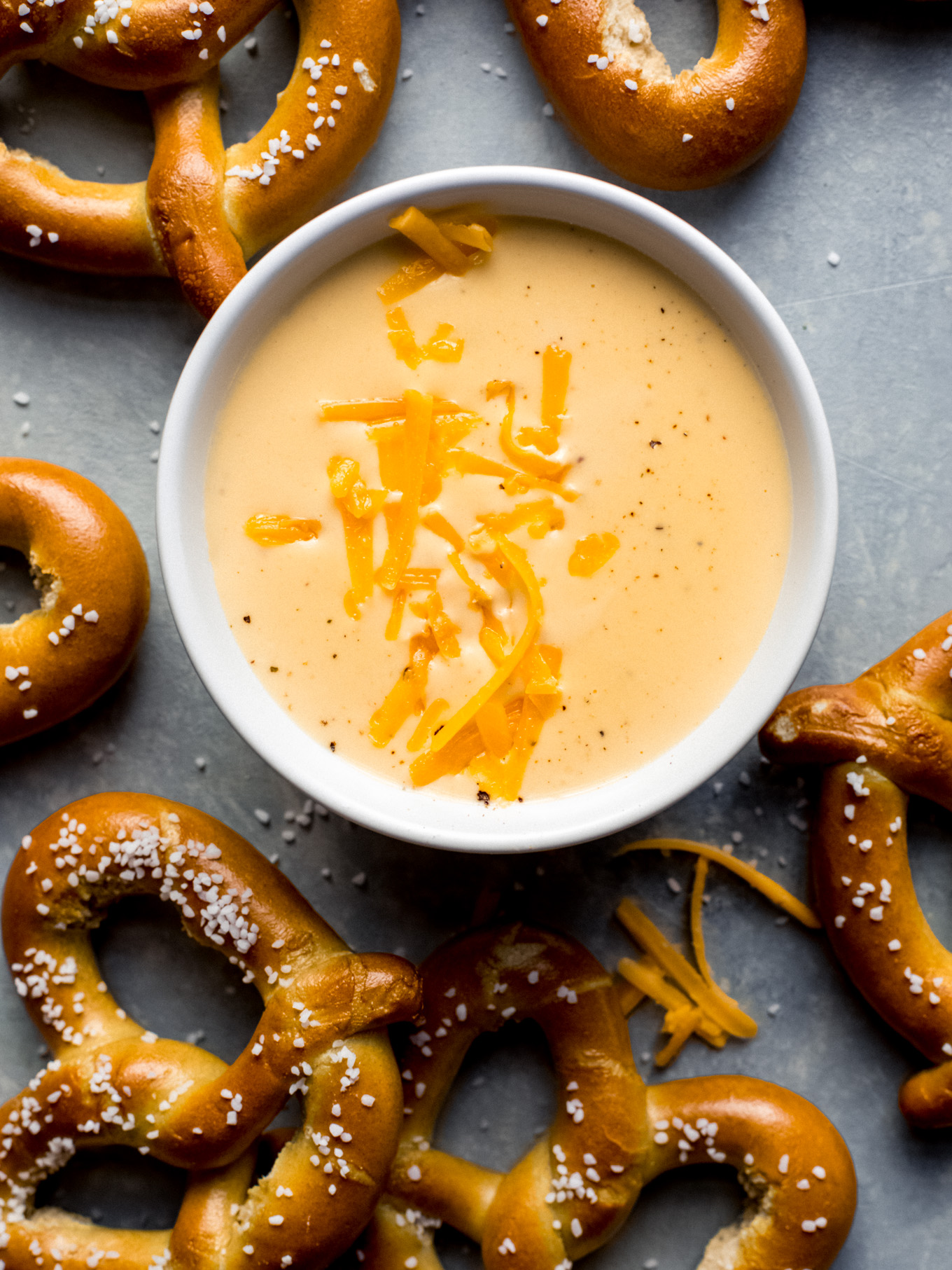 cheese sauce in a white bowl.