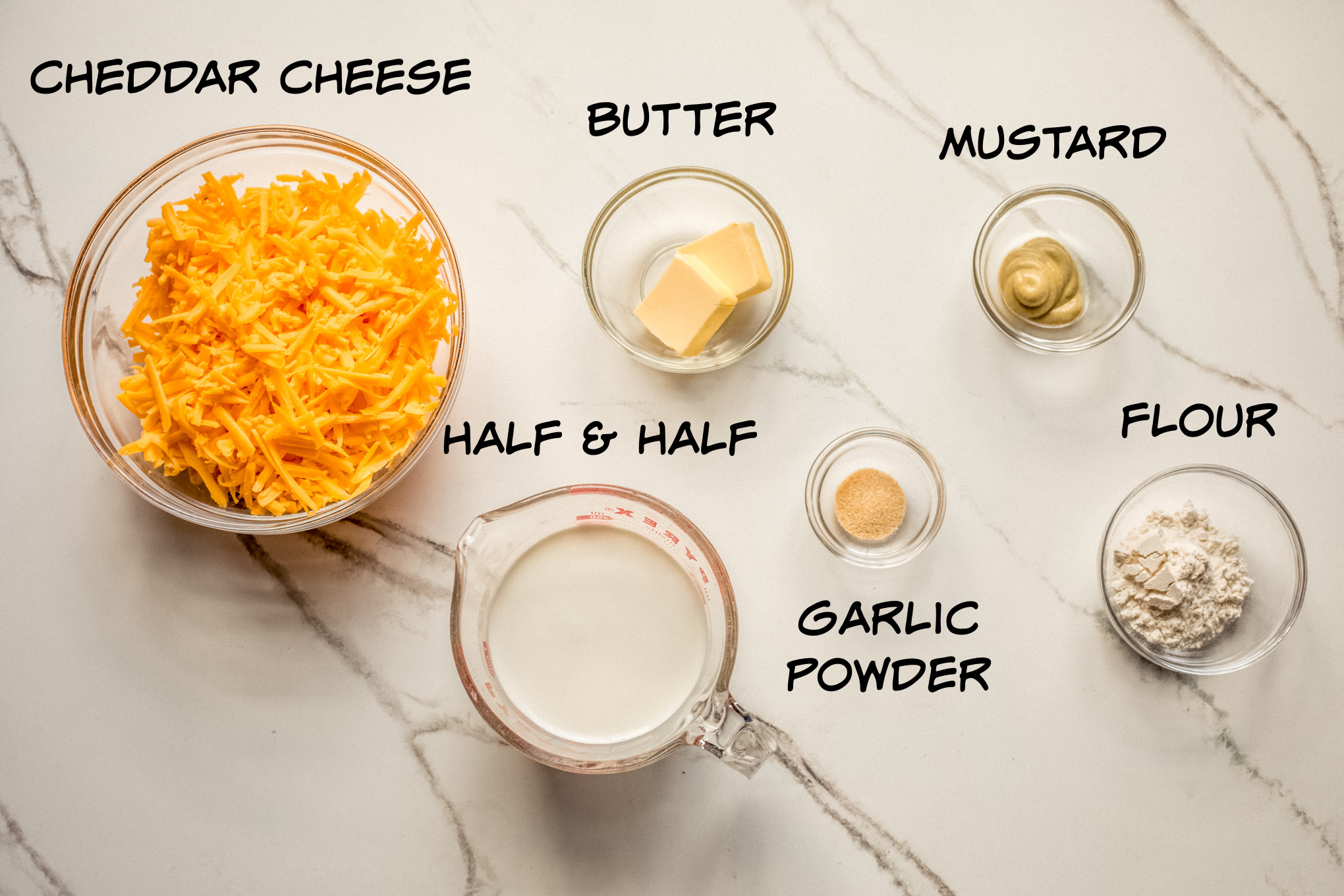 ingredients for homemade cheese sauce recipe.