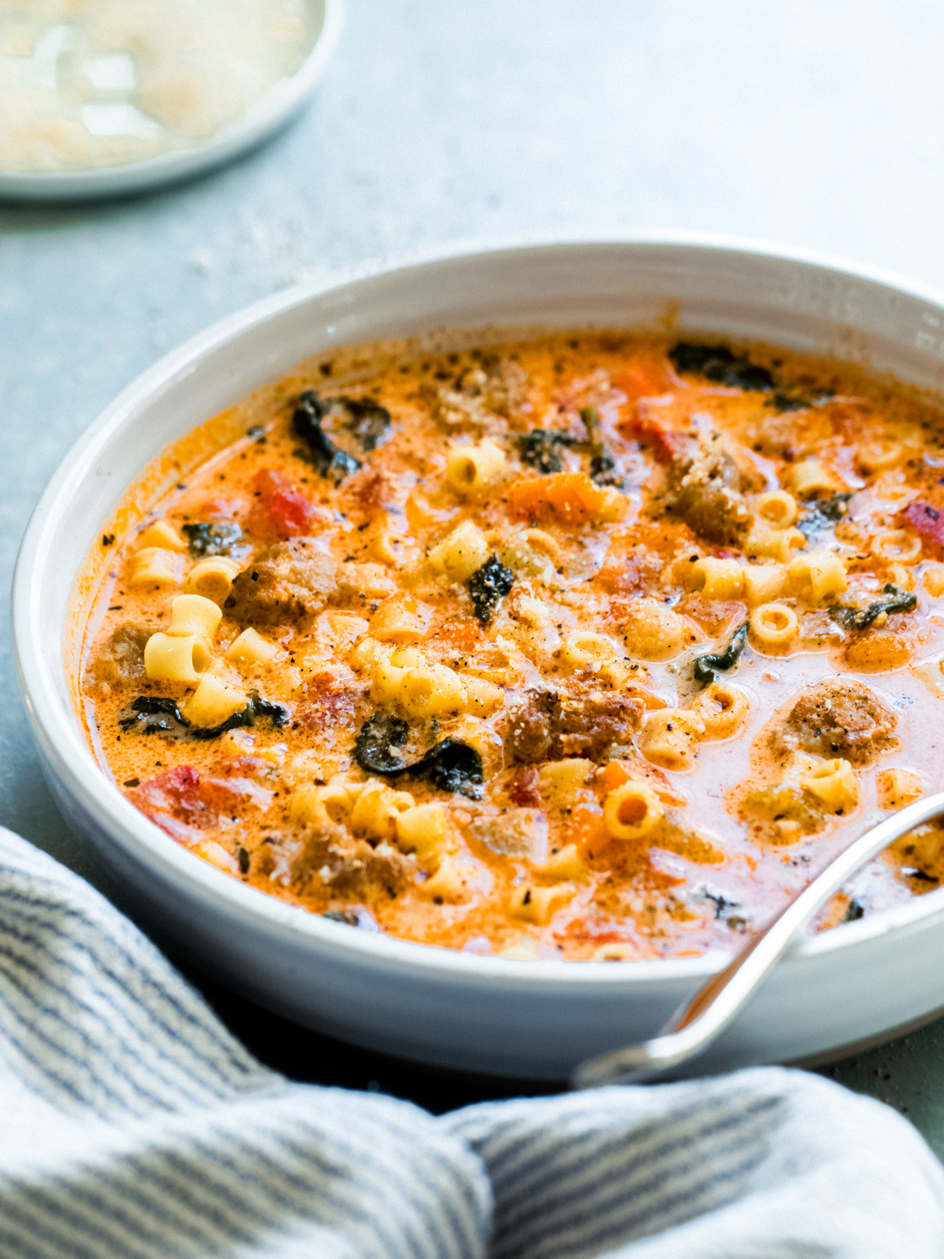 italian soup in a bowl with a spoon.