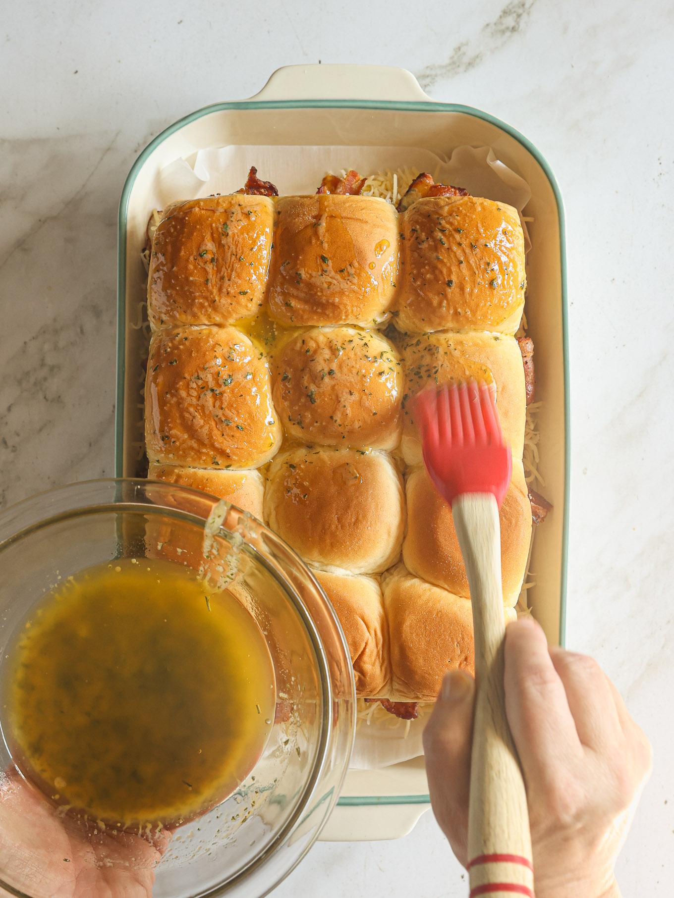 butter brushed on hawaiian rolls.