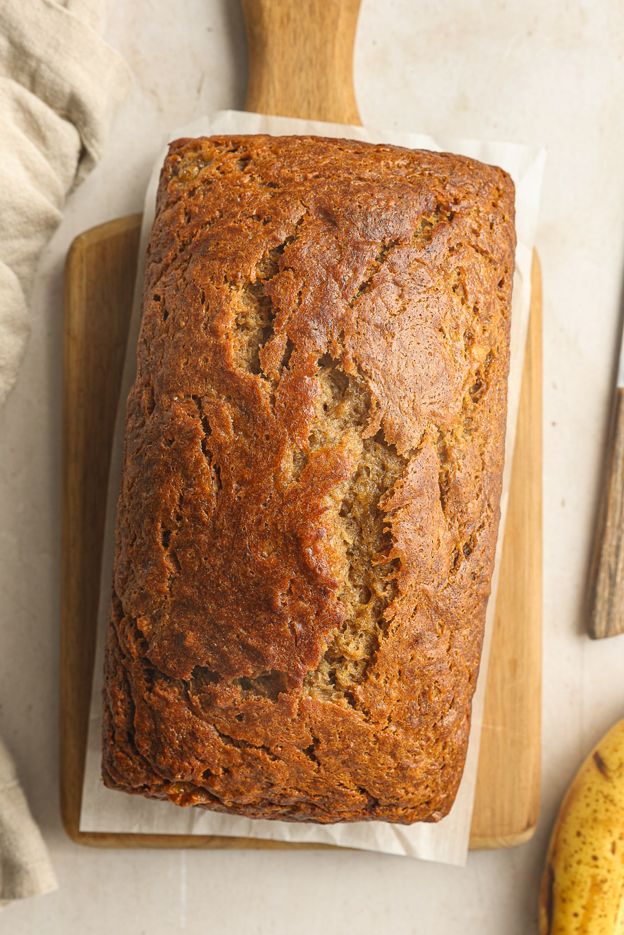 baked banana bread in a loaf pan.
