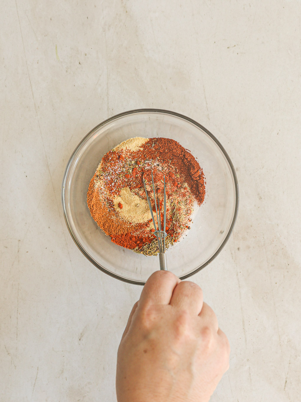 spice mixture in a glass bowl.