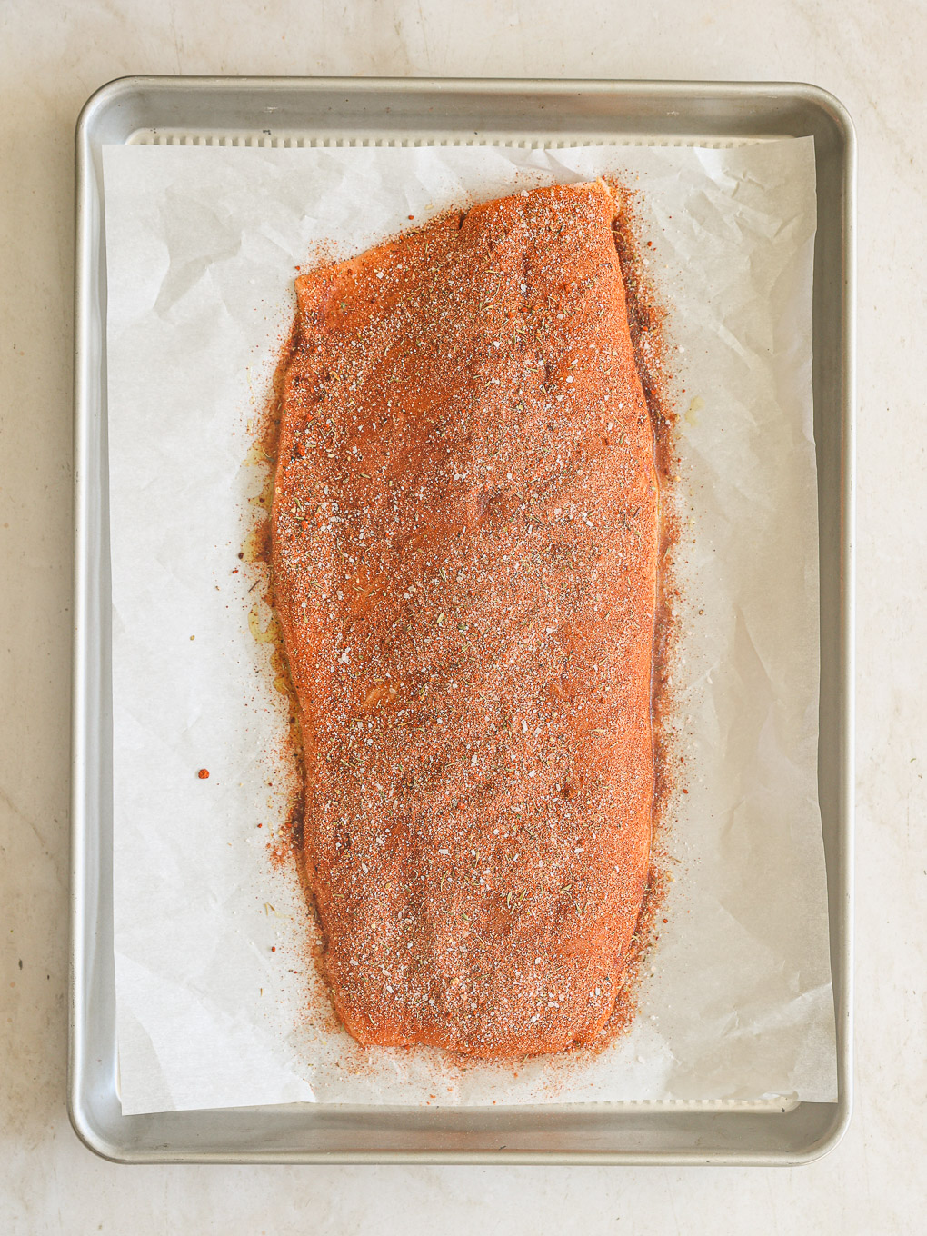 salmon coated in spice mixture.
