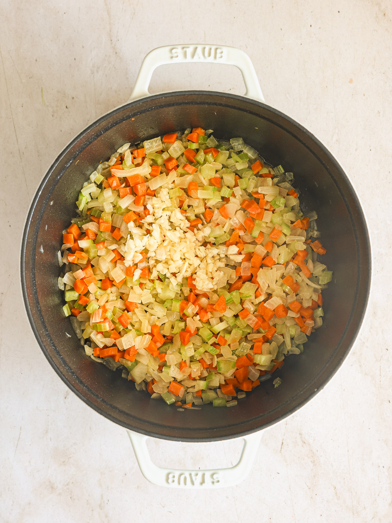 sauted vegetables in a dutch oven.