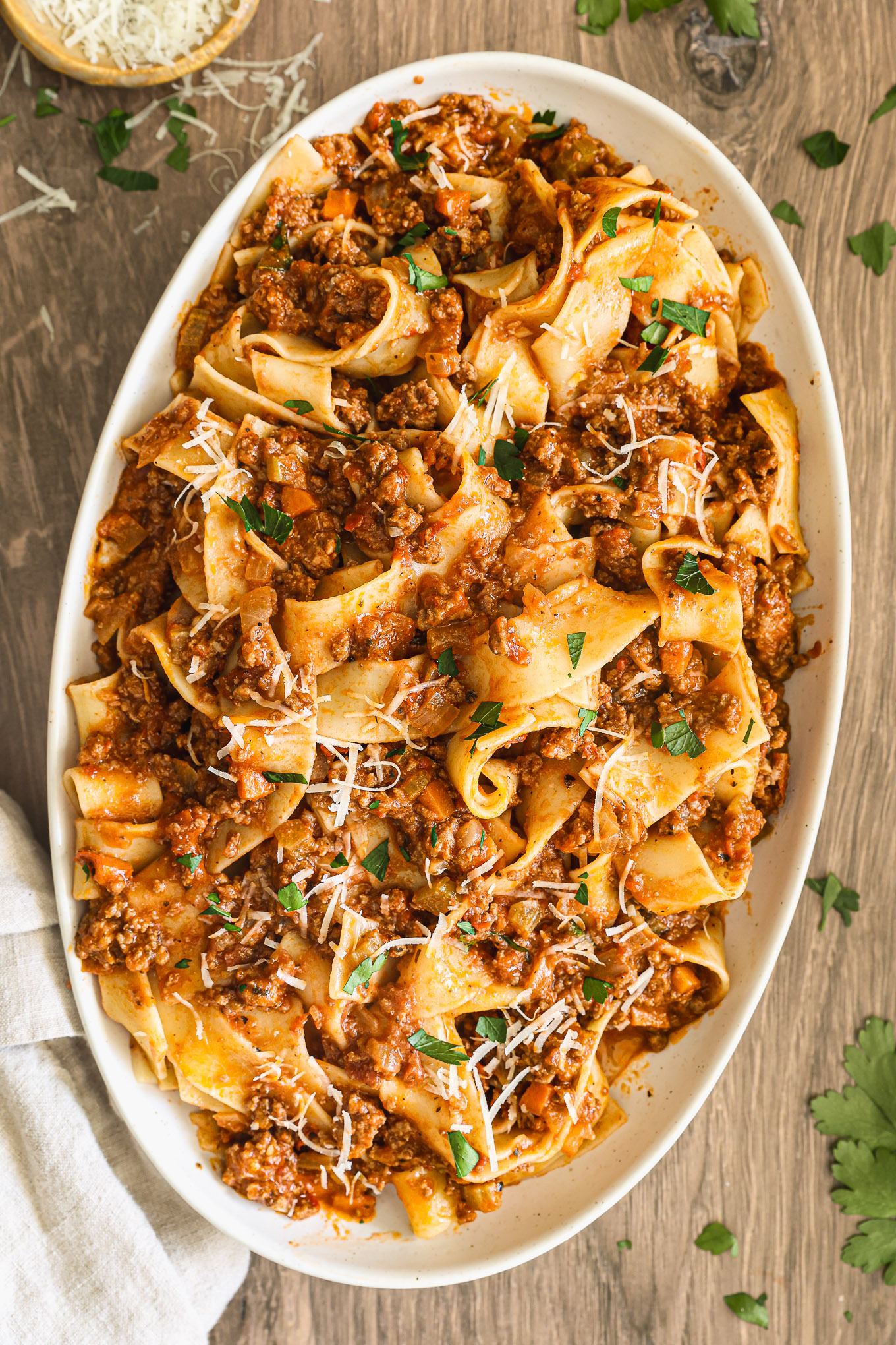 pasta bolognese in oval platter.