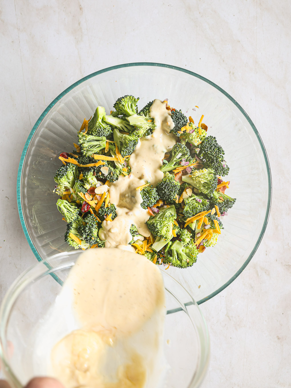 dressing poured over broccoli florets.