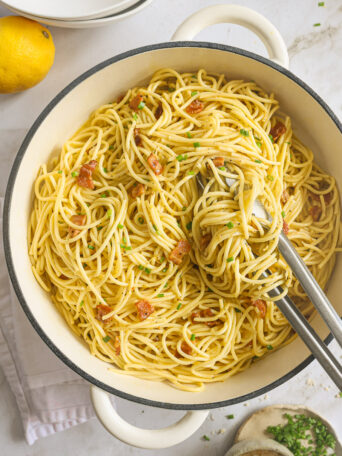 pasta carbonara in a white pan.