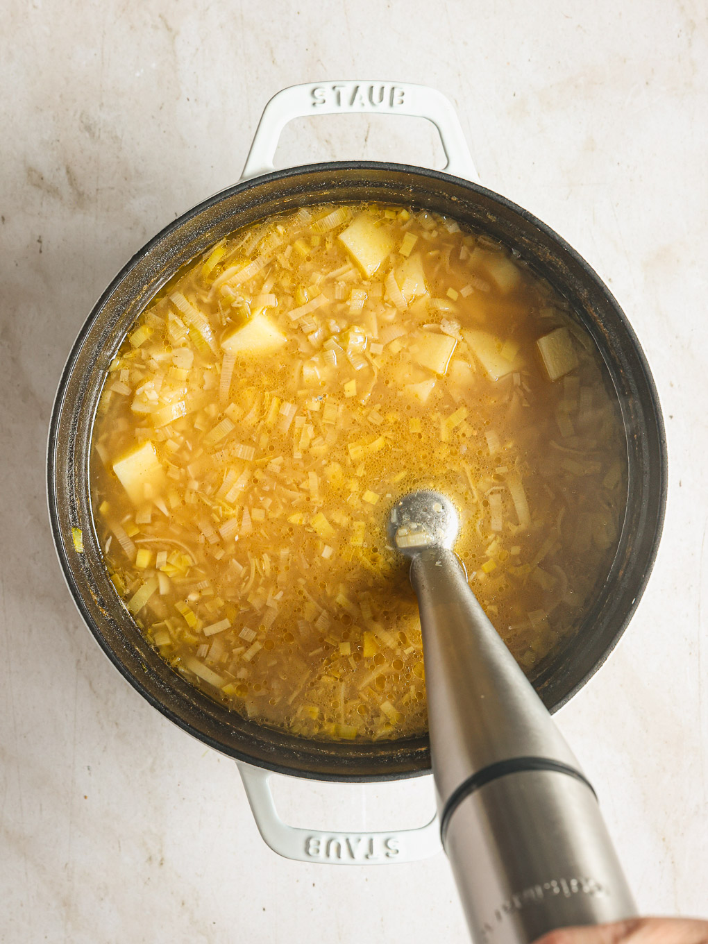 blended soup in a pot.