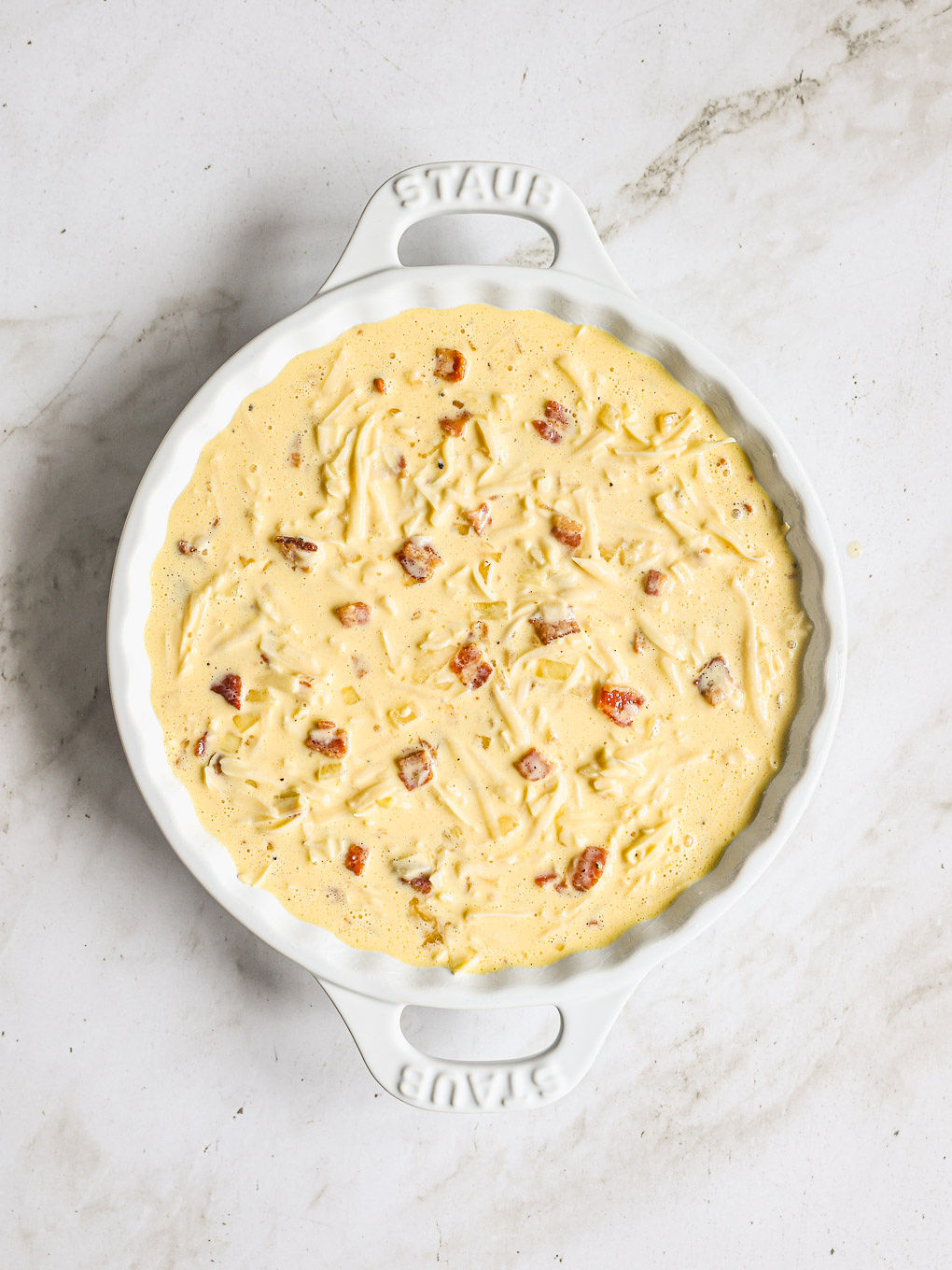 quiche custard in a baking dish.