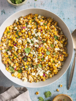 corn salad with cheese in a bowl.
