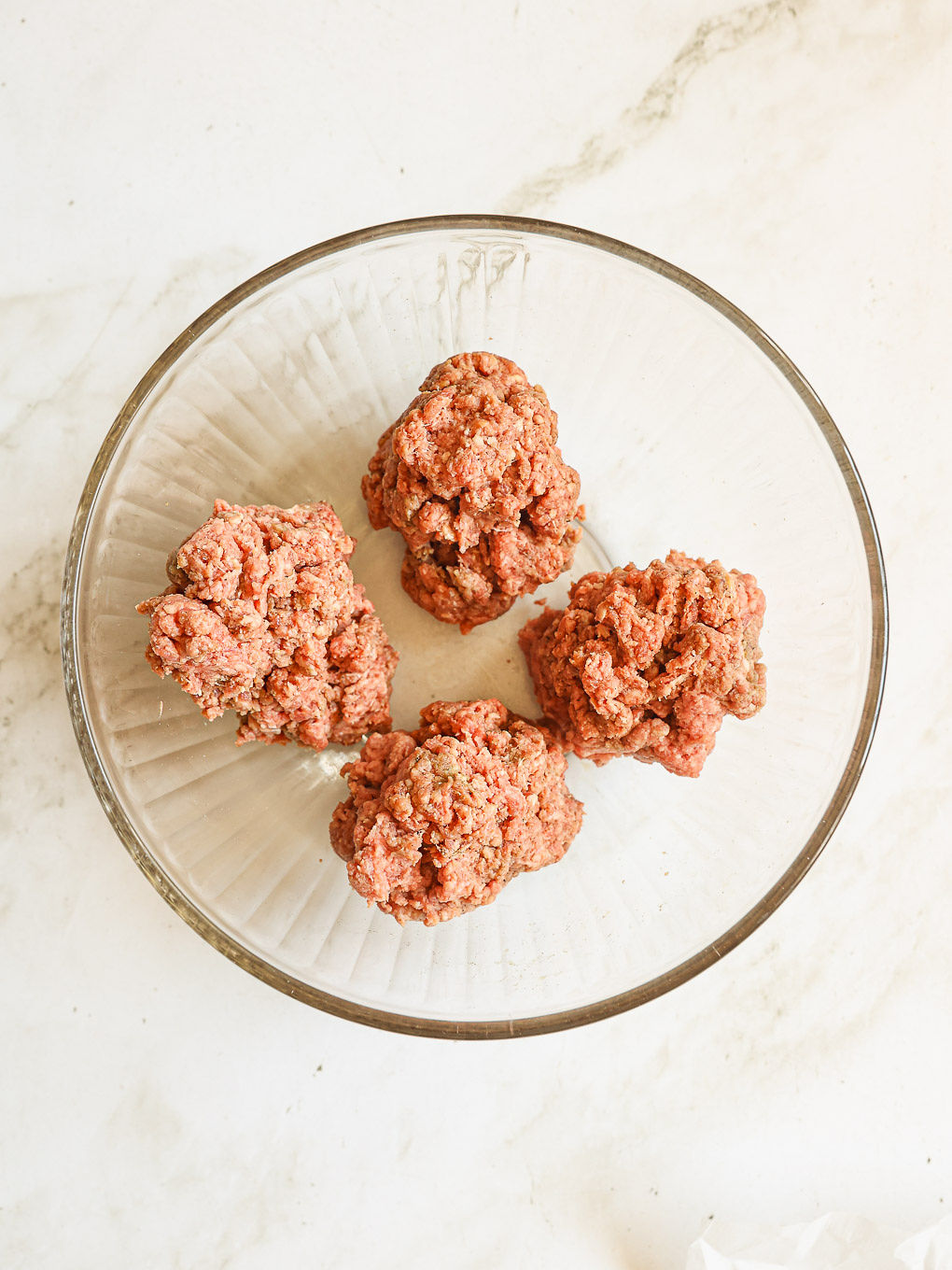 divided beef mixture in a bowl.
