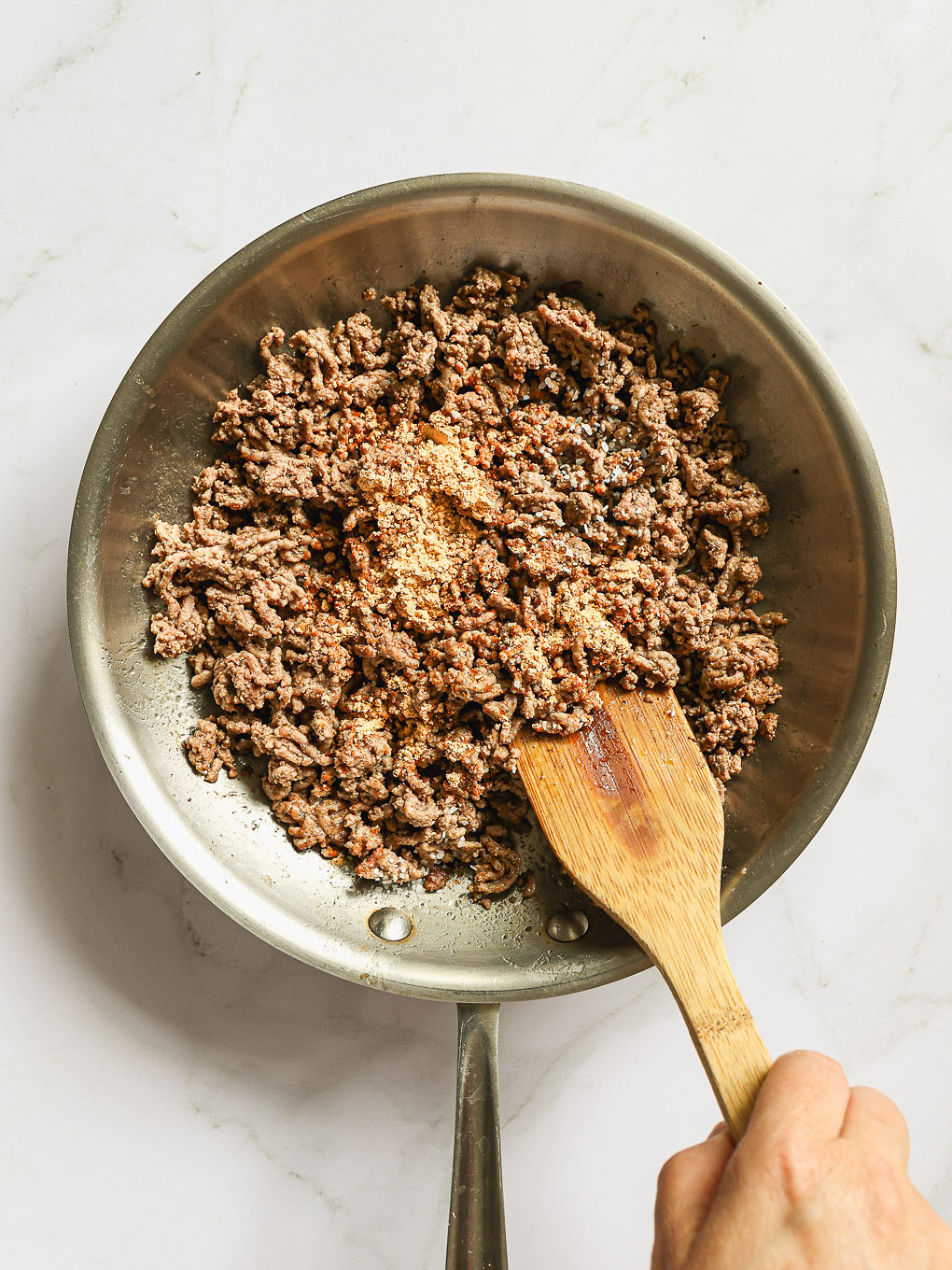 cooked ground beef in a skillet.