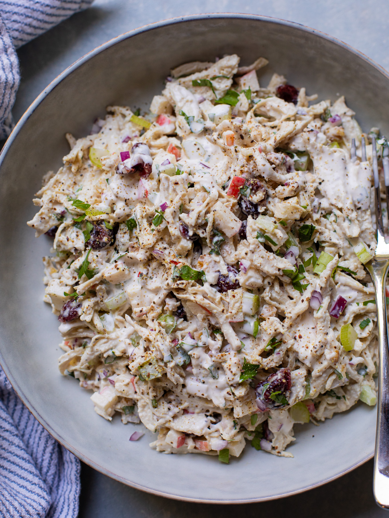 close up of fall chicken salad in a bowl.