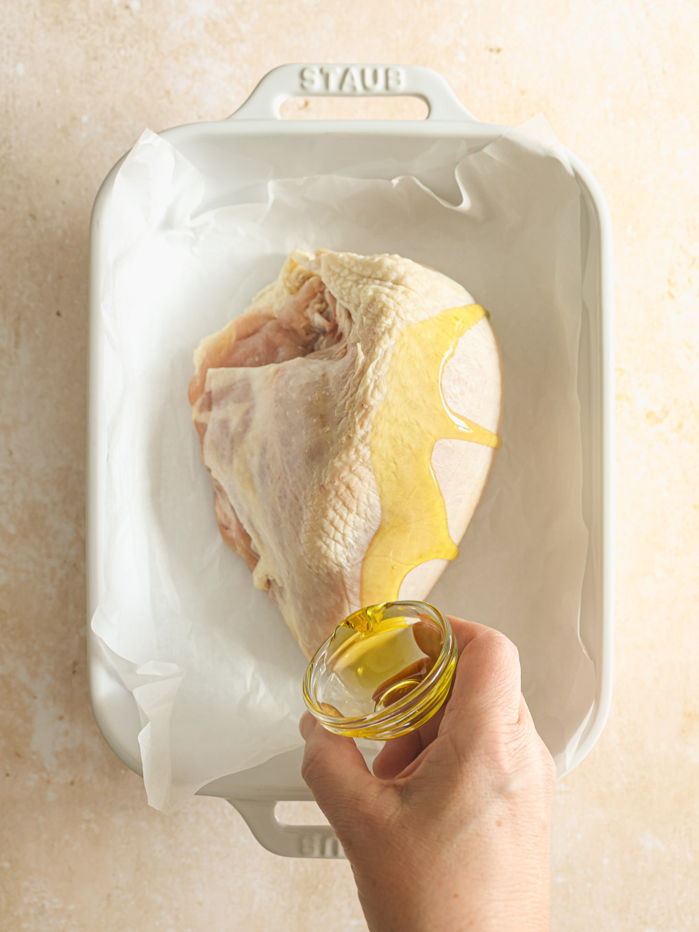 chicken breast covered with oil.