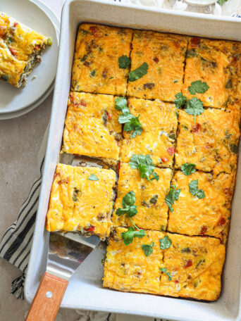 overhead of egg casserole with sausage and peppers.
