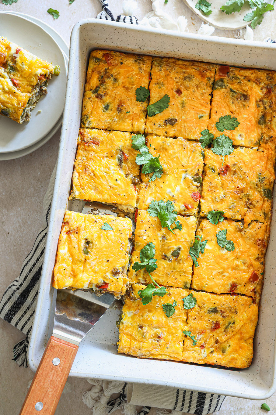 overhead of egg casserole with sausage and peppers.
