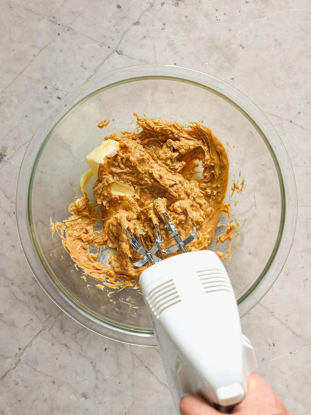 peanut butter in a glass bowl.