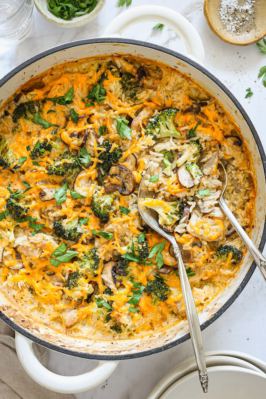overhead close up rice broccoli chicken casserole in a skillet.