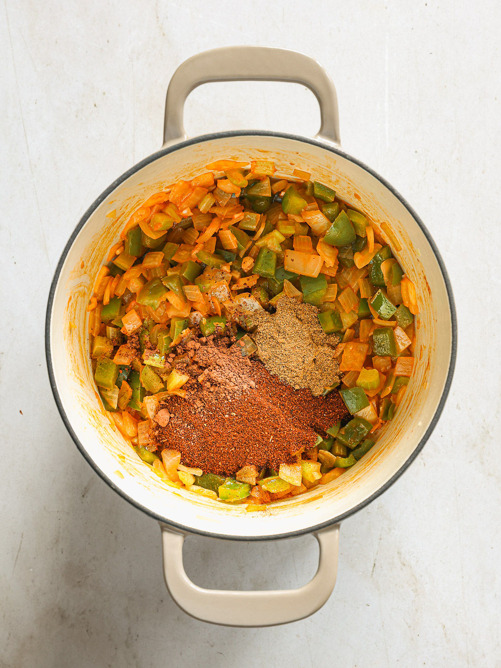 cooked vegetables with spices inside a pot.