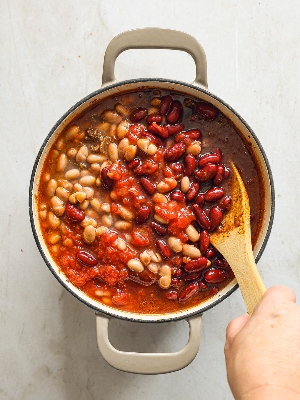 beans with beef inside a pot.